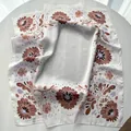 Detail of silk satin scarf featuring vintage brown sun flowers and rolled hem edges - Dark Brown