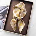Elegant checkered silk scarf with yellow and brown gradients on a vintage tray - Sunflower Yellow