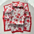 Elegant carnation print silk scarf with red border on white background - Red
