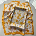 Elegant white silk square scarf with yellow floral print and orange borders - Khaki