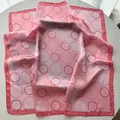 Pink silk square scarf with geometric hollow circle print and smooth satin finish - Pink