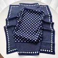 Close-up of vintage navy silk scarf with elegant white polka dots and soft texture - 65cmx65cm / Blue