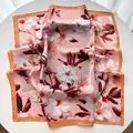 Elegant pink silk scarf featuring white floral prints and mustard yellow borders - Khaki