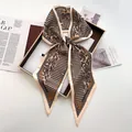 Classic houndstooth and paisley print silk scarf for women displayed on fashion magazines - Ginger Yellow