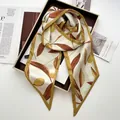 Elegant leaf print silk scarf with golden borders layered in a gift box - Lemon Yellow