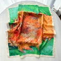Detailed view of the Van Gogh sunflower oil painting print on a silky satin scarf surface - Light Green