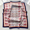 Ivory satin square scarf with colorful rocking horse print and navy blue borders - Blue