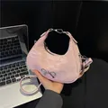 Pink crescent underarm bag with pleated texture and silver bow detail for daily use - Pink