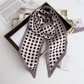 French vintage polka dot satin skinny scarf in beige and black on a gold tray - Light Purple