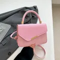 Pink linen contrast handbag with gold metal clasp and adjustable shoulder strap - Pink