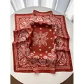 Elegant red square silk scarf with white paisley patterns for versatile styling - Caramel color