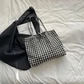 Minimalist black and white gingham canvas tote bag with drawstring ribbon detail - Black