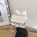 Sweet white mini crossbody bag with large bow and black polka dots for girls - White