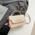 Elegant beige shoulder bag with gold metal buckle and leather handle for women - Khaki