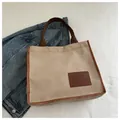 Beige corduroy tote bag with brown handles and fashion label for college students - Khaki