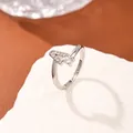Polished silver letter A ring with micro-p鑲ed zircon stones on a white stone background - Letter A Style