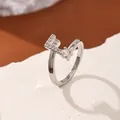 Adjustable silver letter E ring with pavé cubic zirconia and a round solitaire stone - Letter F Style