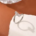 Adjustable silver letter J ring featuring micro-pave cubic zirconia and a round center stone - Letter J Style