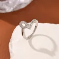 Silver-toned ring with micro-pave cubic zirconia accents and a polished finish - Letter O Style