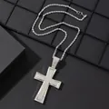 Macro detail of iced-out cross pendant with sparkling stones on silver rope chain - Pendant And Rope Chain / Silver