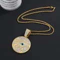 Detailed view of gold plated Eye of Horus pendant with rhinestones and rope chain - Pendant + Twist Chain / Gold