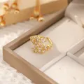 Detailed macro view of 18K gold plated ring featuring marquise-cut zircon leaf design - Wheat Ear & Leaf Design (Style D)