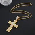 Macro detail of iced-out gold cross pendant with rope chain on black surface - Pendant And Rope Chain / Gold