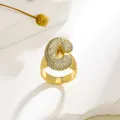 Macro view of adjustable gold-plated ring featuring bubble letter C with micro-pavé zircons - Letter C Style / Gold