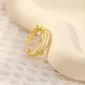 Macro detail of 18K gold plated ring featuring double-row baguette cubic zirconia - Double Row Baguette Rhinestone Open Ring (Style G)