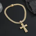 Detailed close-up of iced-out gold Cuban link necklace with a large cross pendant - Pendant And Cuban Chain / Gold