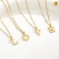Gold titanium steel LOVE letter pendant necklaces set on a white ceramic tray - Letter A / Gold
