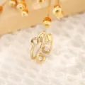 Close-up of 18K gold plated octagonal geometric ring with white zircon stones on lace - Double Octagon Open Style (J款)