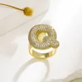Verstellbarer vergoldeter Ring mit Buchstabe Q und Zirkonia-Besatz im modischen Design - Buchstabe Q Stil / Gold