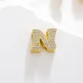 Golden pendant featuring a capital letter N encrusted with sparkling cubic zirconia - Letter N Style