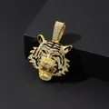 Close-up of golden tiger pendant with sparkling pavé crystals on black background - Pendant Only / Gold
