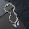 Detail of hip hop Cuban link chain with angel wings pendant and blue center stone - Pendant + Cuban Chain / Silver