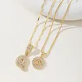Golden Q letter necklace set with sparkling zircon stones in a stylish layered design - Q Pendant And Necklace