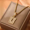 Detailed close-up of 18K gold plated U-letter pendant with pavé set cubic zirconia stones - Letter U / Gold