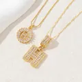 Golden letter H pendant necklace set with square and pavé-set sparkling zircons - Letter H
