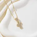 Collier avec pendentif lettre Y dorée serti de zircones cubiques sur plateau blanc - Lettre Y