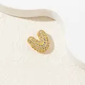 Macro shot of gold heart pendant with micro-pave white cubic zirconia on stone surface - V-Pendant Only (Without Chain)