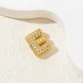 Detailed macro view of gold-plated letter E pendant with cubic zirconia inlay stones - E-Pendant Only (Without Chain)