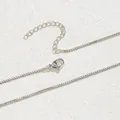 Elegant silver box chain necklace featuring a lobster clasp and adjustable extension link - Box Chain / Silver