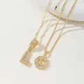 Golden iced out letter L pendant necklaces set with zircon stones and link chain - L Pendant And Necklace