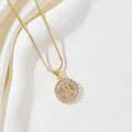 Golden round pendant necklace with letter R and baguette-cut zircon insets - Letter R