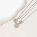 Silver-tone necklace with letter G and C pendants featuring baguette-cut zircon inlays - Letter G / Silver