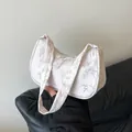 Minimalist white hobo bag with bamboo leaf print and sleek single shoulder strap - White