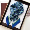 Detailed view of square silk scarf with geometric patterns in a premium gift box set - 70cmx70cm / Blue Green Geometric Letter Pattern (41)