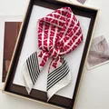 Elegant silk scarf with red butterfly print and black white stripes displayed on tray - Printed Square Scarf / Red Butterfly Stripe (38)
