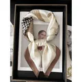 Retro brown silk scarf with houndstooth and horse print folded on a magazine - 70*70cm / Milky White